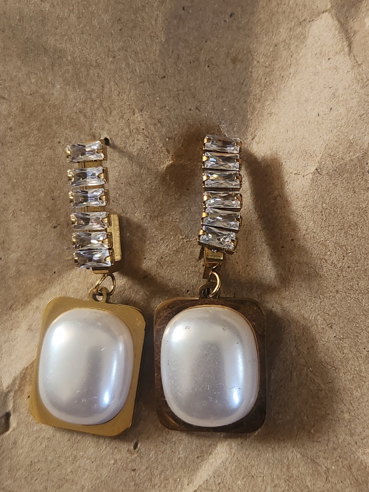 Dangler oval earrings